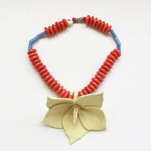Red Beaded Necklace with Cream Floral Pendant